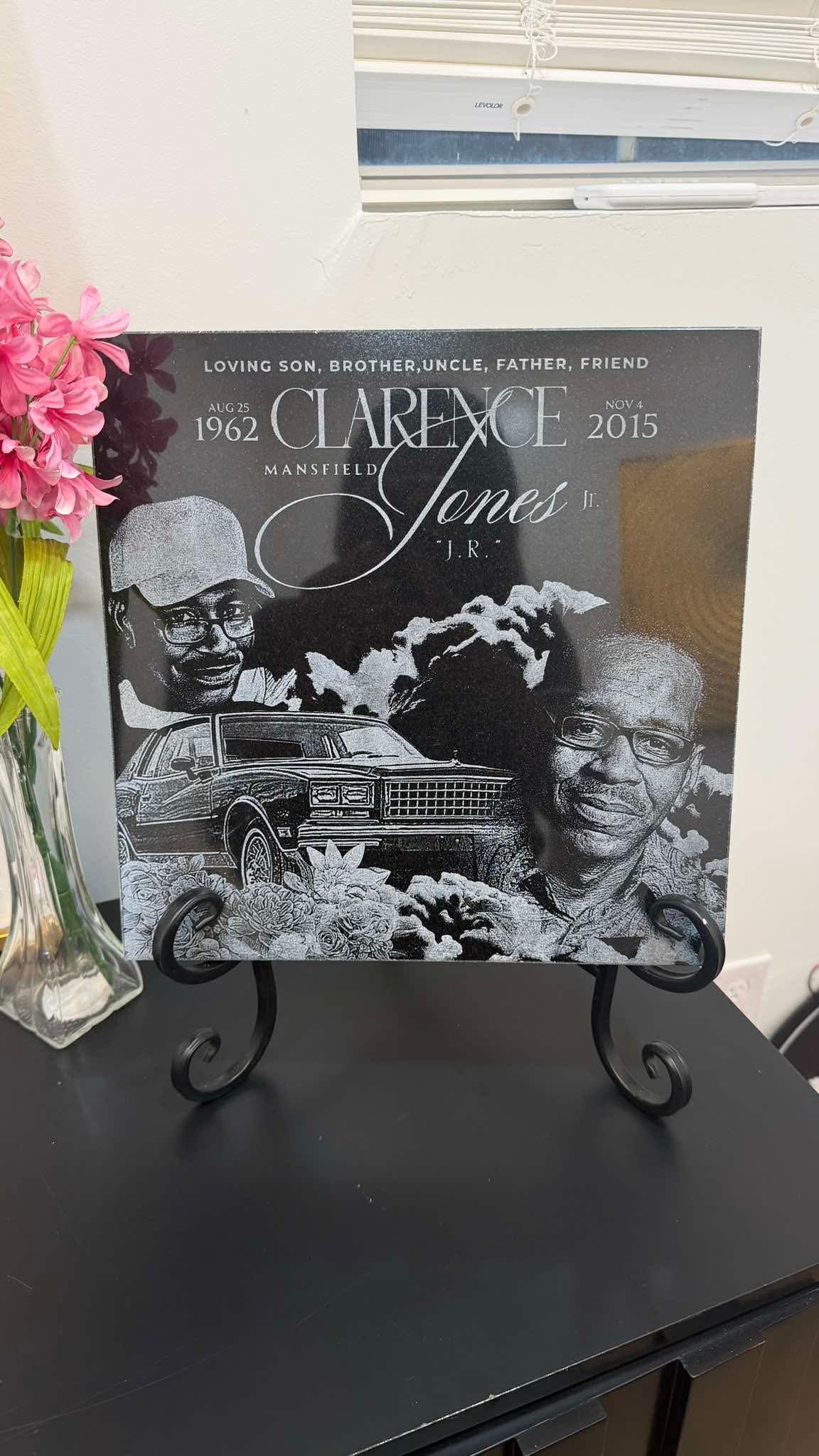 Personalized memorial slate displayed on a table stand